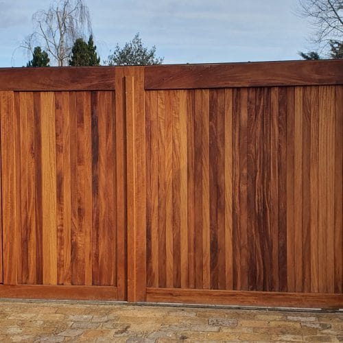 wicket gate fitted into a sliding gate made from iroko