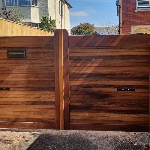 letter box fitted into iroko gates