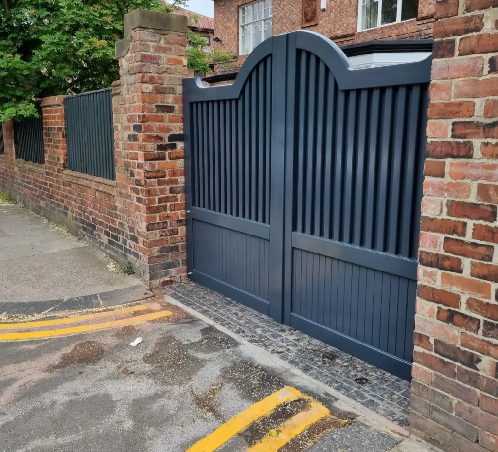 Special bespoke wooden painted gates made from hardwood finished in RAL7016